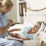 nurse talking to a patient nurse talking to a patient