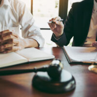 Lawyer explained to the client about the law that must be brought against the court case. Lawyer explained to the client about the law that must be brought against the court case.