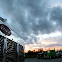 Image of the grill of a semi-truck, representing how West Virginia truck accident lawyers help accident victims.