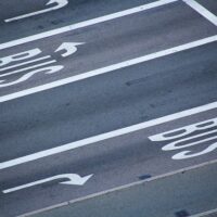 Bus lanes on a road, representing the need for a West Virginia bus accident lawyer when crashes occur.