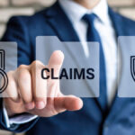 Professional businessman interacts with digital interface for claims processing and financial protection