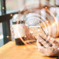 Man using mobile global network connection on social media virtual screen. Digital technology and networking. Man using mobile global network connection on social media virtual screen. Digital technology and networking.