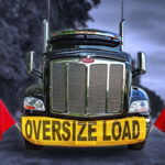 The front of a semi-truck looms large, representing the scale of possible damage in West Virginia trucking accident claims.